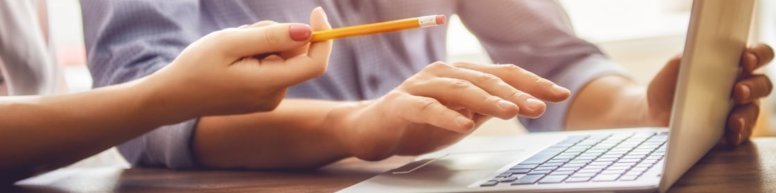 Employees using computers in an office