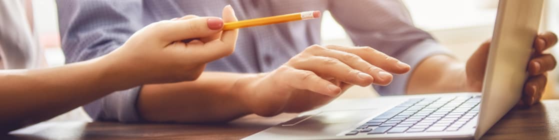 Employees using computers in an office