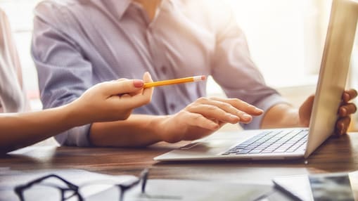 Employees using computers in an office